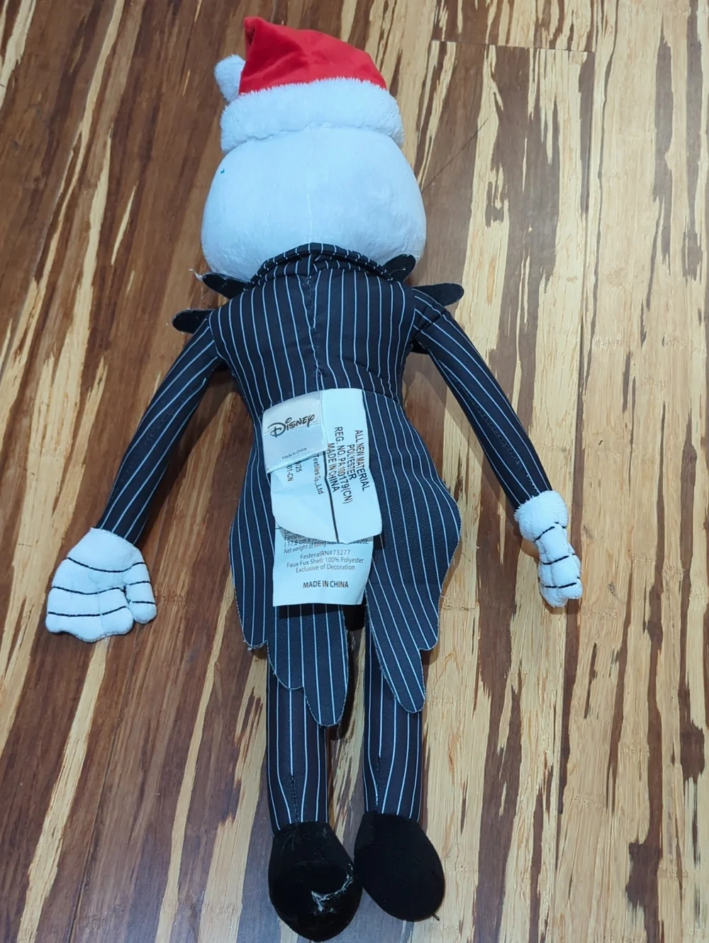 Disney Black & White Jack Skellington Plush with Red Hat Pom